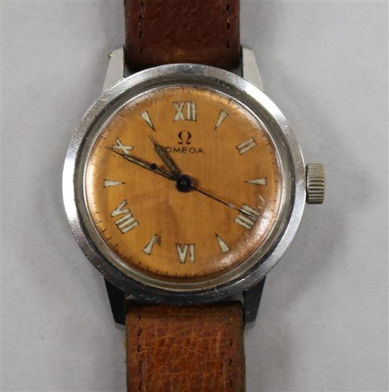 A gentlemans early 1940s stainless steel Omega manual wind wrist watch with copper coloured dial.